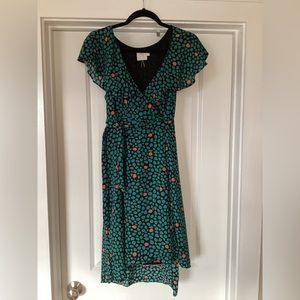 Green and black wrap dress